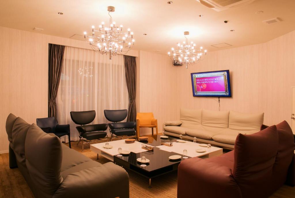 Posezení v ubytování Hostel ilfaro Kurume