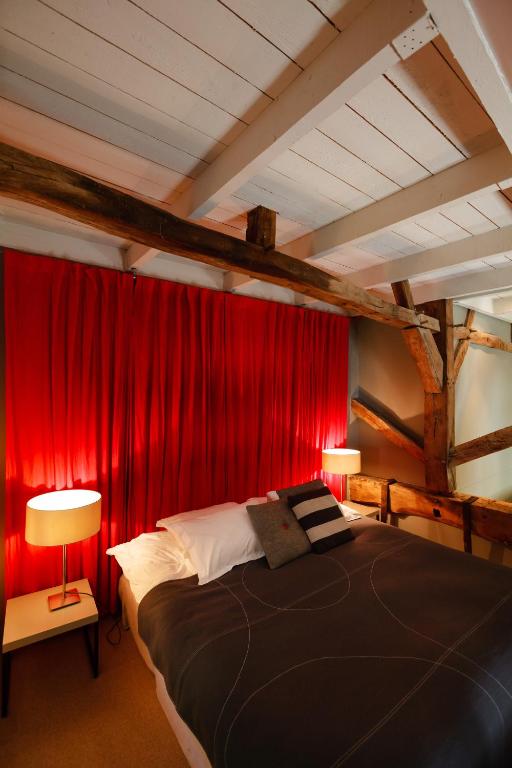 Postel nebo postele na pokoji v ubytování Moulin Renaudiots - Maison d'hôtes