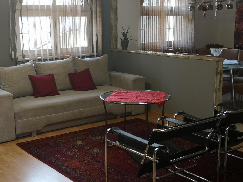 Posezení v ubytování Hotello Apartmanház és Panzió