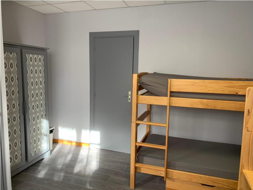 Palanda nebo palandy na pokoji v ubytování Hotel Caplandes