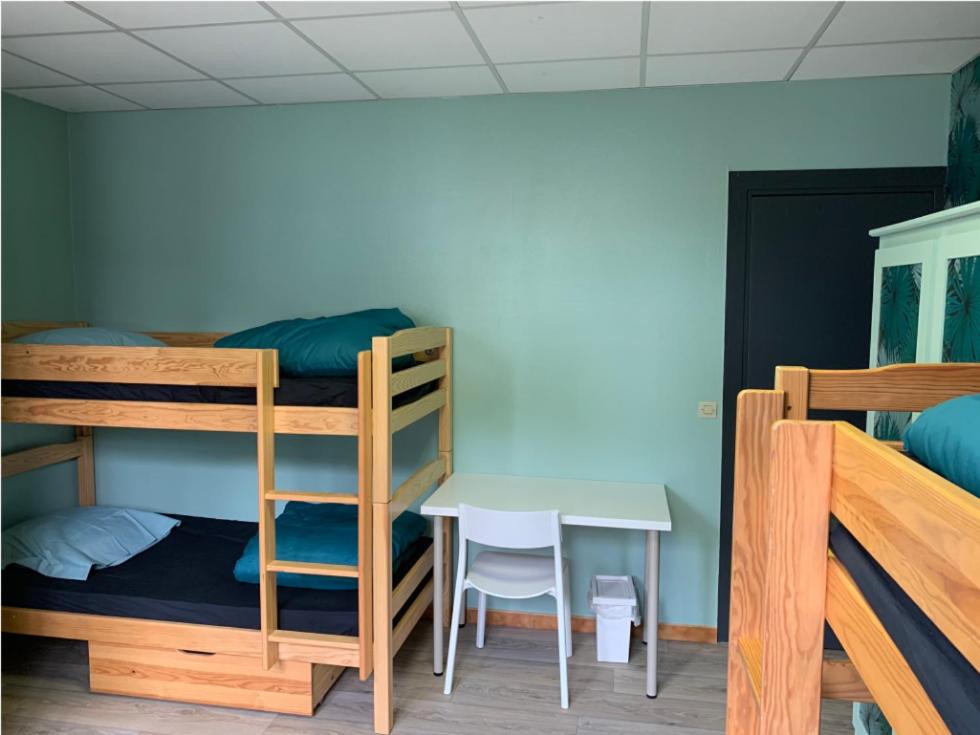 Postel nebo postele na pokoji v ubytování Hotel Caplandes