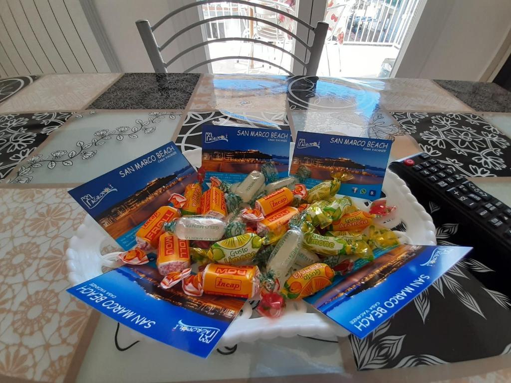 a table topped with a pile of snacks on a table at San Marco Beach App Libeccio in Agropoli