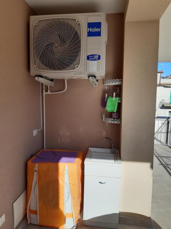 a room with a air conditioner on a wall at San Marco Beach App Libeccio in Agropoli