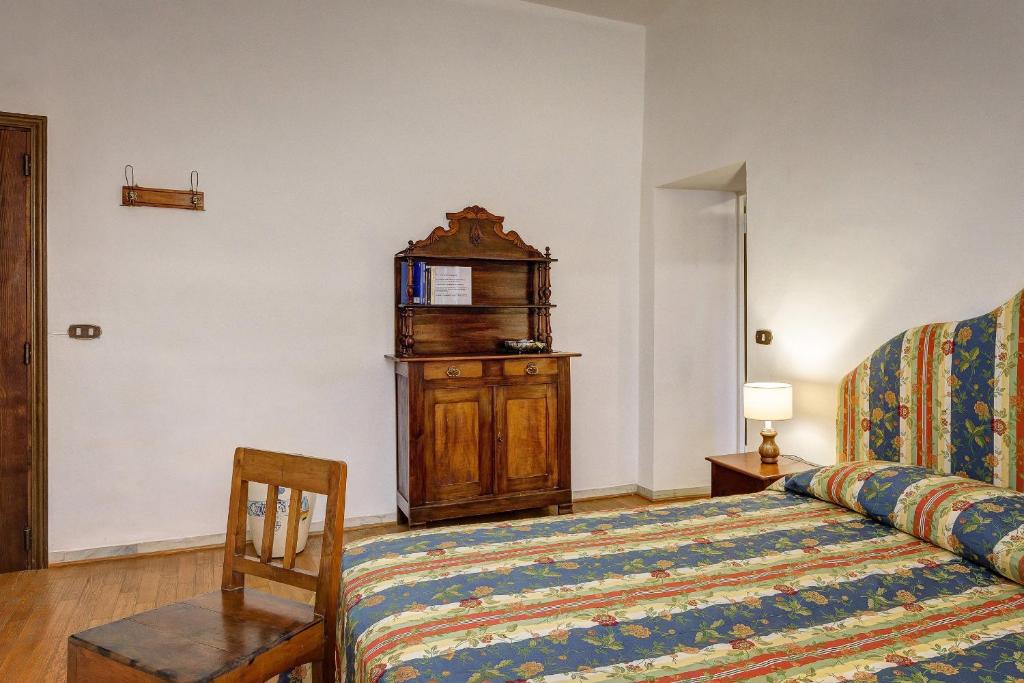 Postel nebo postele na pokoji v ubytování La Rocca