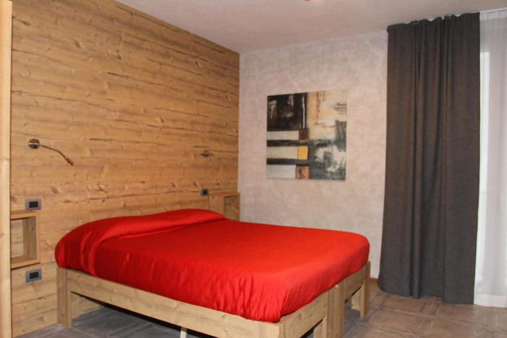 Postel nebo postele na pokoji v ubytování B&B Corte Rossa