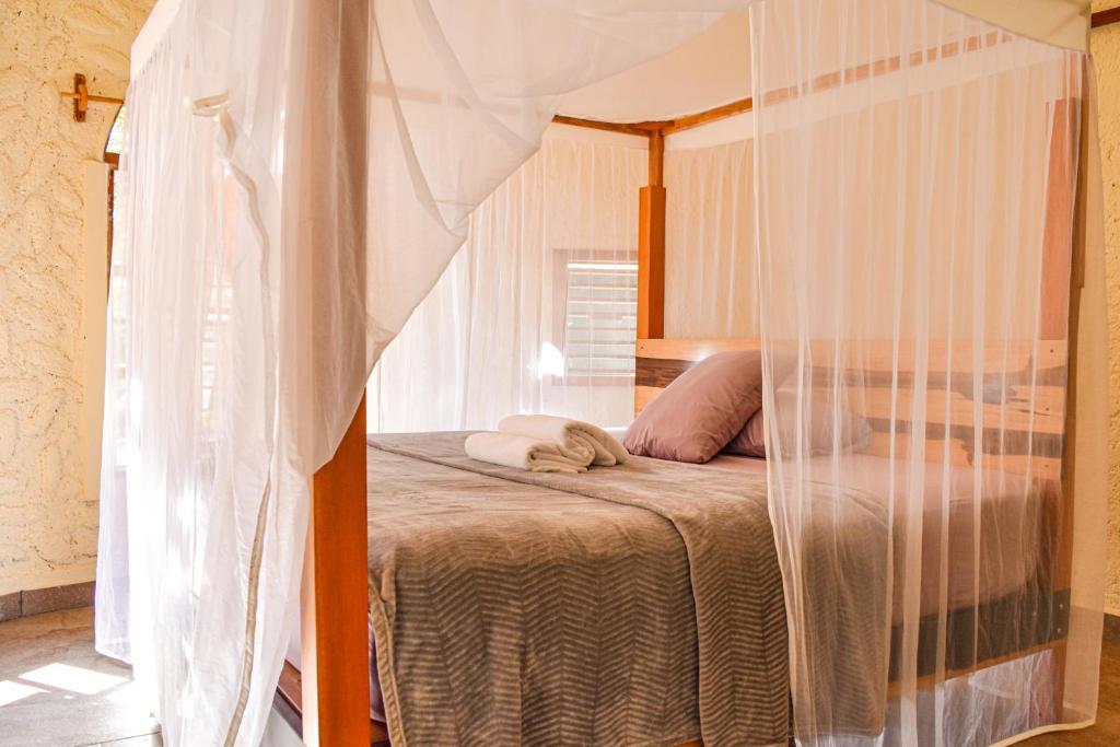 Postel nebo postele na pokoji v ubytování Villas Ecotucan