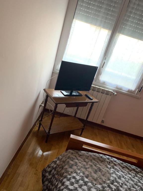 Telewizja i/lub zestaw kina domowego w obiekcie Bicocca Flat A