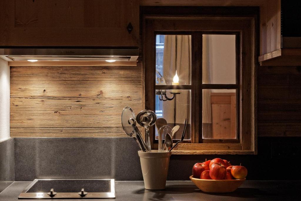 Kuchyň nebo kuchyňský kout v ubytování Himmlhof Small Luxury Boutique Hotel