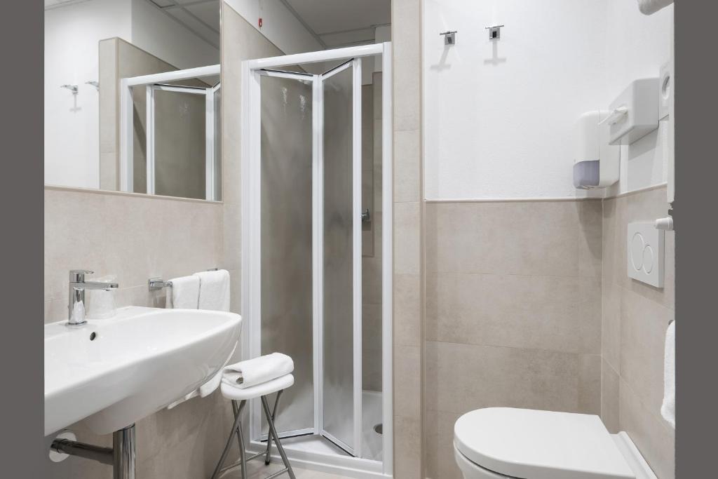 Koupelna v ubytování Hotel Martini