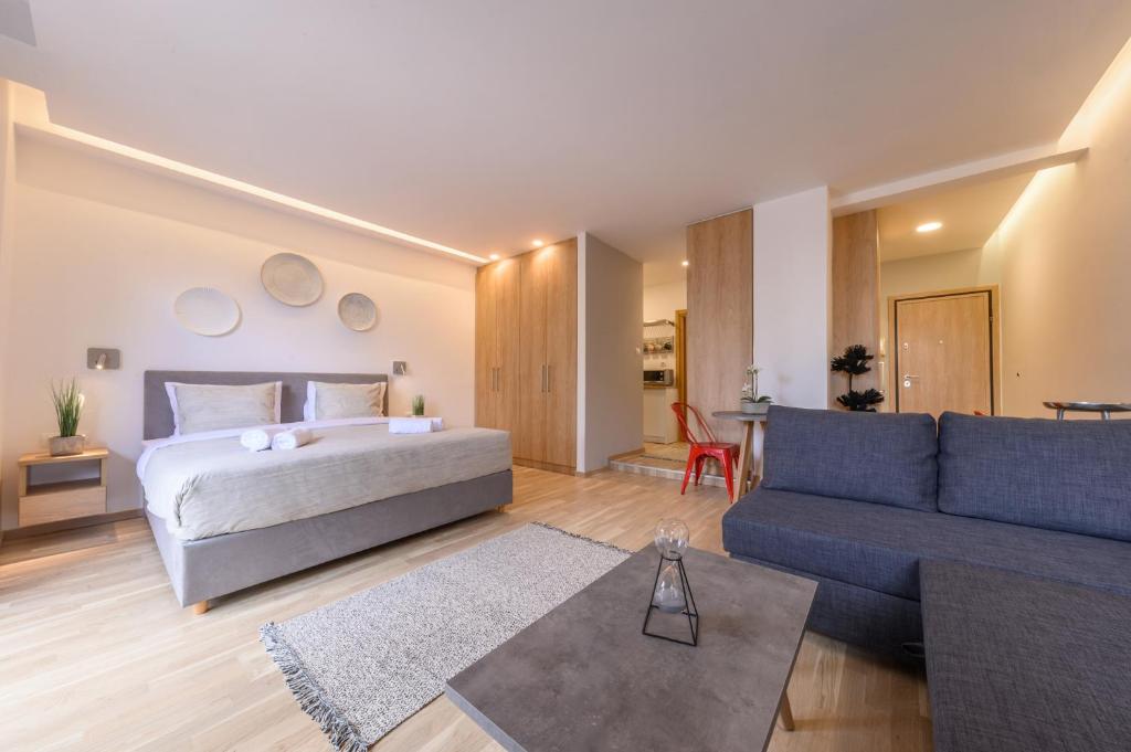 Postel nebo postele na pokoji v ubytování MAGNOLIA City Suite