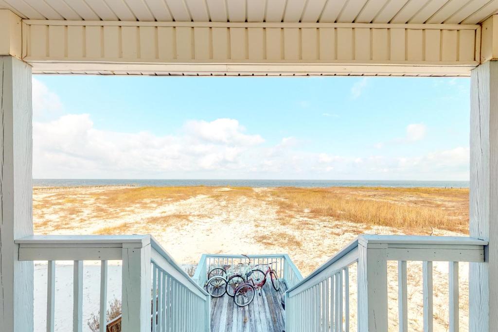 a view of the beach from a house balcony at Beachy Keen in Dauphin Island