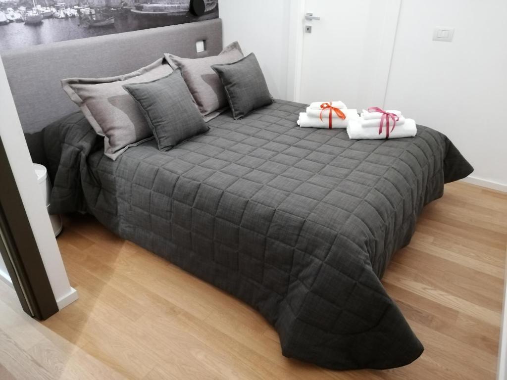 A bed or beds in a room at B&B VISTAZZURRA - Casa Saldarelli