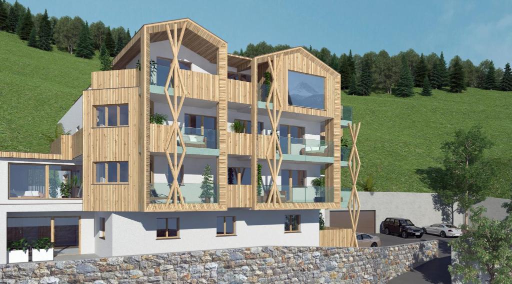 an architectural rendering of a building with wooden balconies at Haus Piz Lad in Nauders