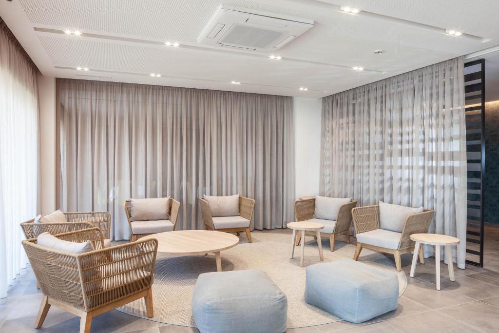 Posezení v ubytování Hotel Montecarlo Spa & Wellness
