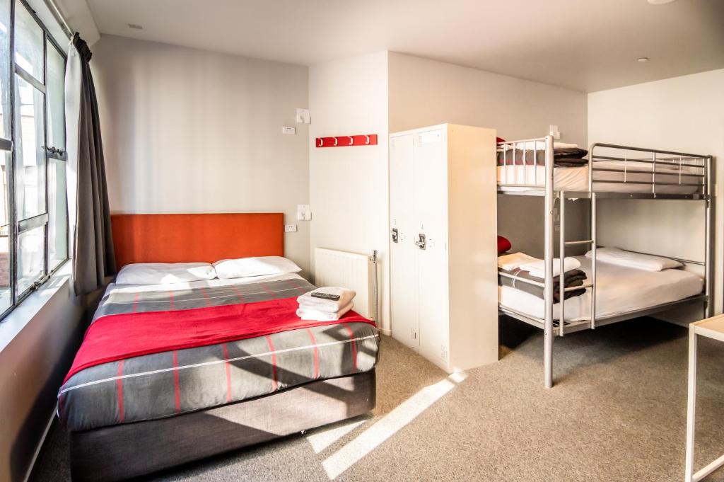 Postel nebo postele na pokoji v ubytování Urbanz