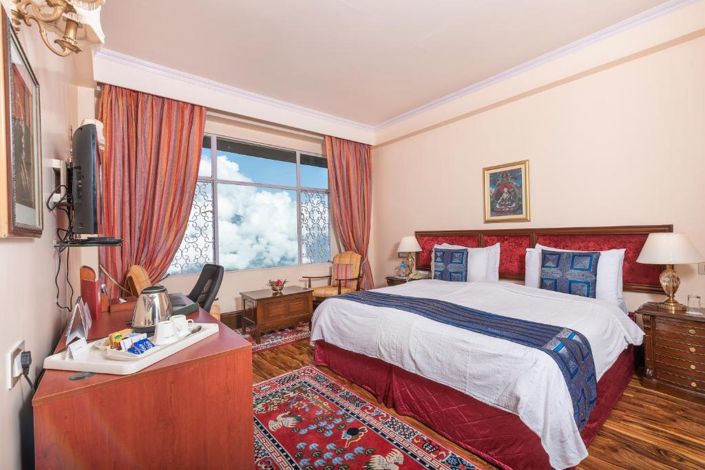 Voodi või voodid majutusasutuse The Elgin Mount Pandim - Heritage Resort & Spa toas