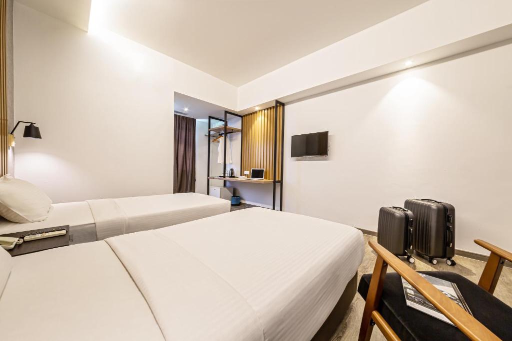 TV a/nebo společenská místnost v ubytování Thy Executive Hotel