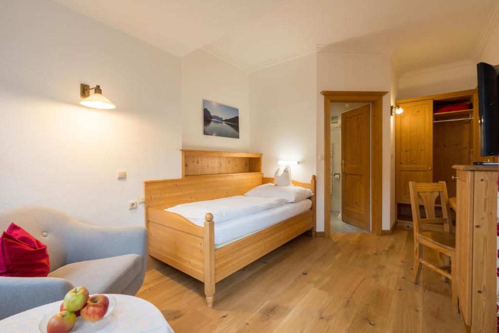 Postel nebo postele na pokoji v ubytování Hotel-Garni Schernthaner