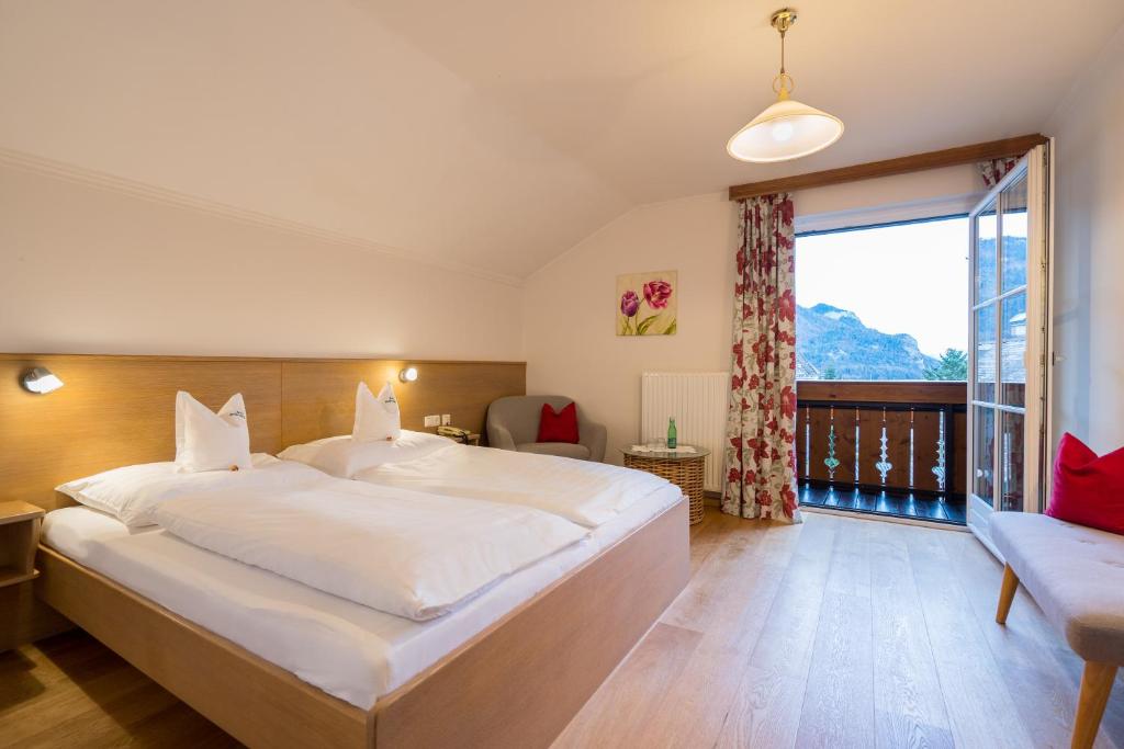 Postel nebo postele na pokoji v ubytování Hotel-Garni Schernthaner