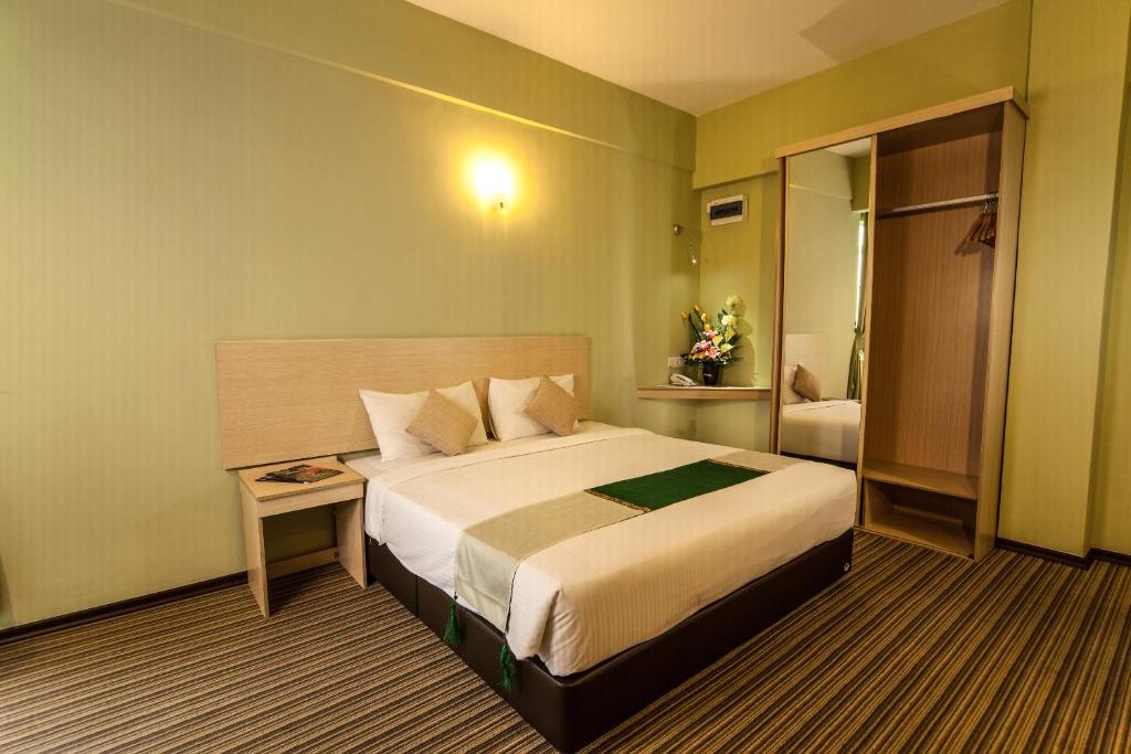 Postel nebo postele na pokoji v ubytování Thy Executive Hotel