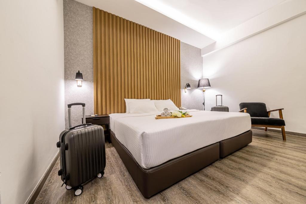 Postel nebo postele na pokoji v ubytování Thy Executive Hotel