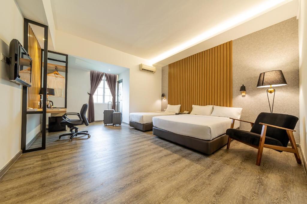 Postel nebo postele na pokoji v ubytování Thy Executive Hotel