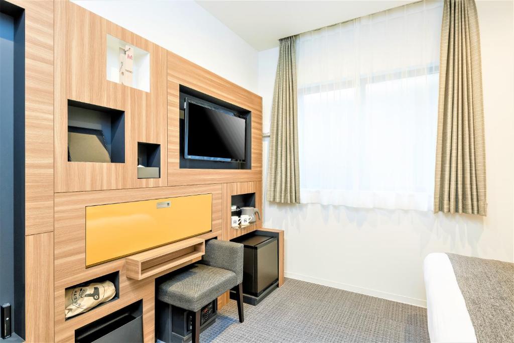 TV a/nebo společenská místnost v ubytování M's Hotel Sanjo Wakoku