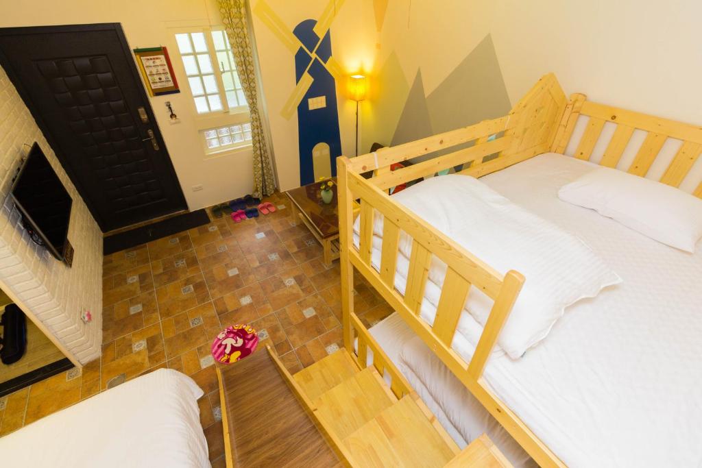 Postel nebo postele na pokoji v ubytování 獨立麻雀小屋4-6人房-不會接觸到其他旅客