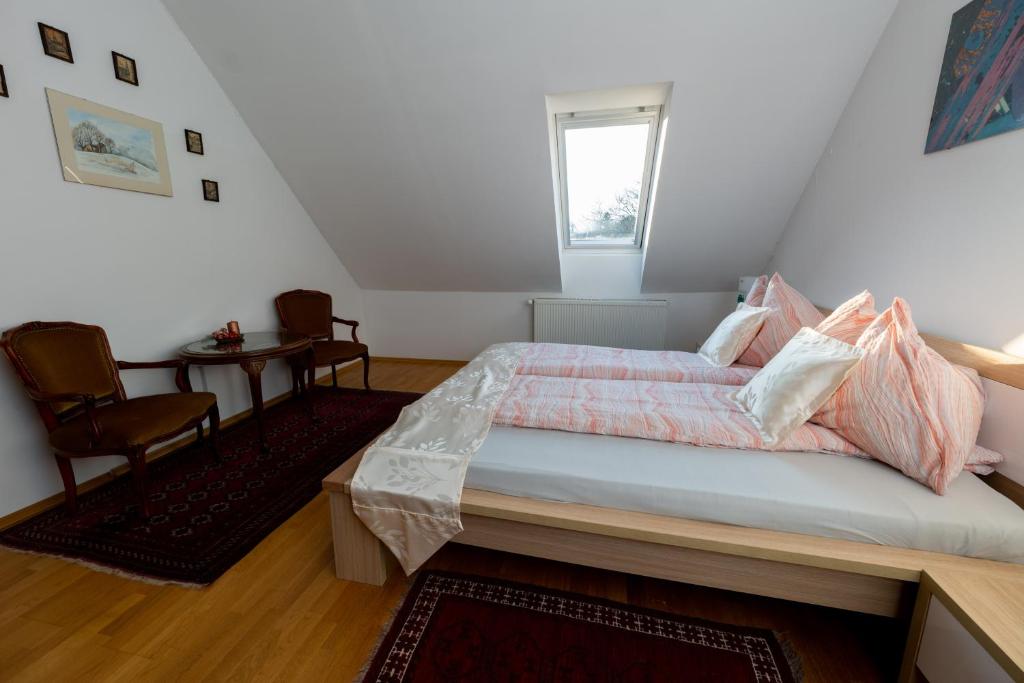 Postel nebo postele na pokoji v ubytování Villa Tabody