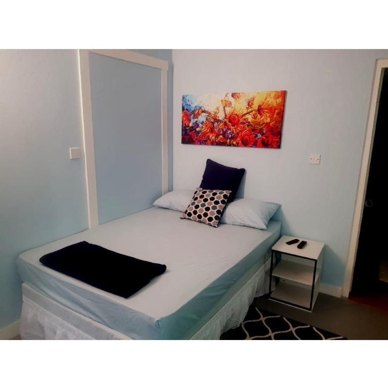 Postel nebo postele na pokoji v ubytování Careffe Suites St Lucia