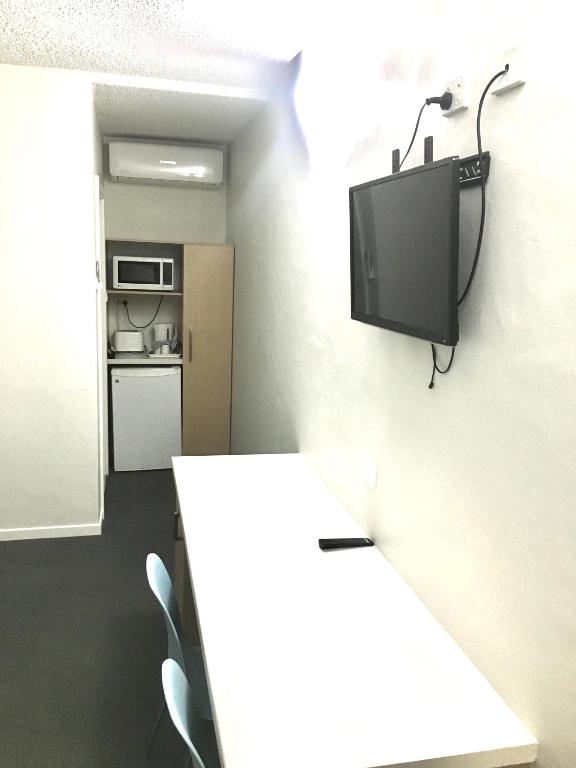 Kuchyň nebo kuchyňský kout v ubytování The Sands Motel Adelaide
