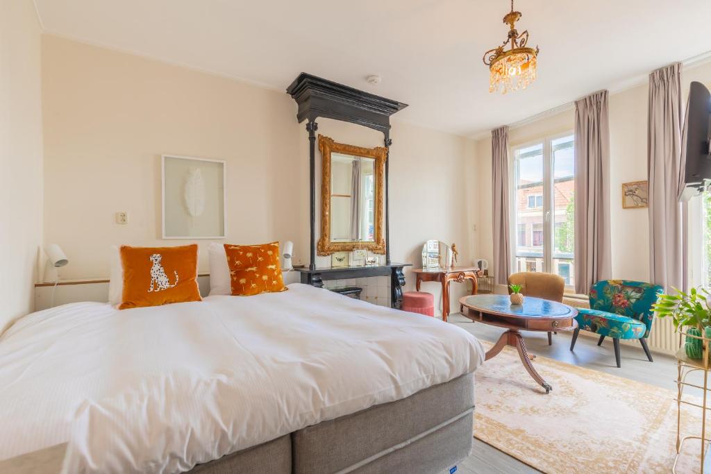 Postel nebo postele na pokoji v ubytování LOT Hotel