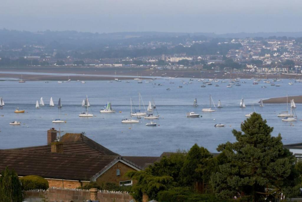 a view of a large body of water with boats at Violet Mays Retreat in Starcross