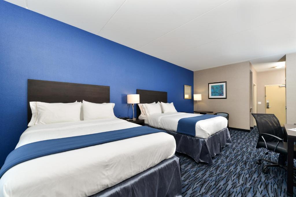 Postel nebo postele na pokoji v ubytování Holiday Inn Express & Suites Peekskill-Lower Hudson Valley by IHG