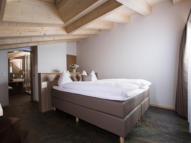Postel nebo postele na pokoji v ubytování Hotel Silberhorn