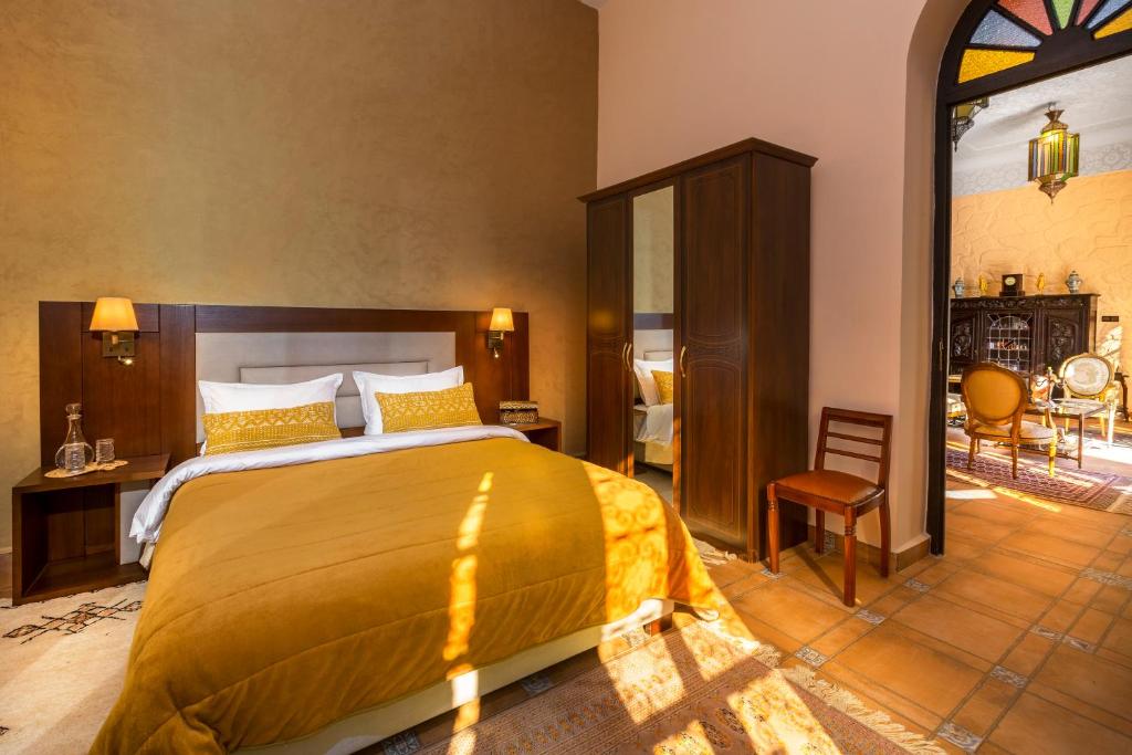 Postel nebo postele na pokoji v ubytování La Citadelle Marrakech