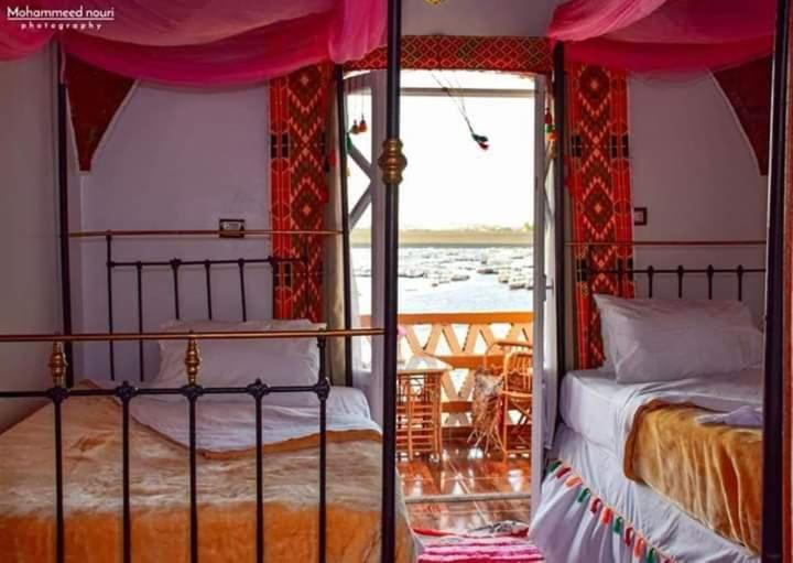 Lova arba lovos apgyvendinimo įstaigoje Old Nubian guest house