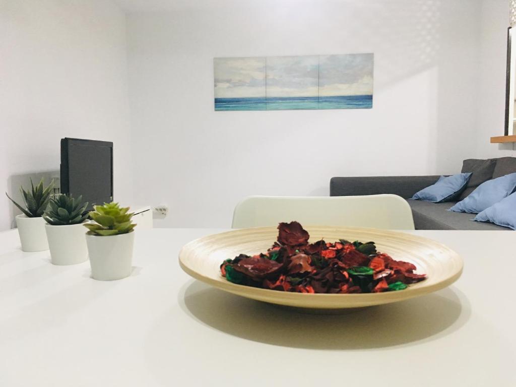 A seating area at Albir cosy apartment