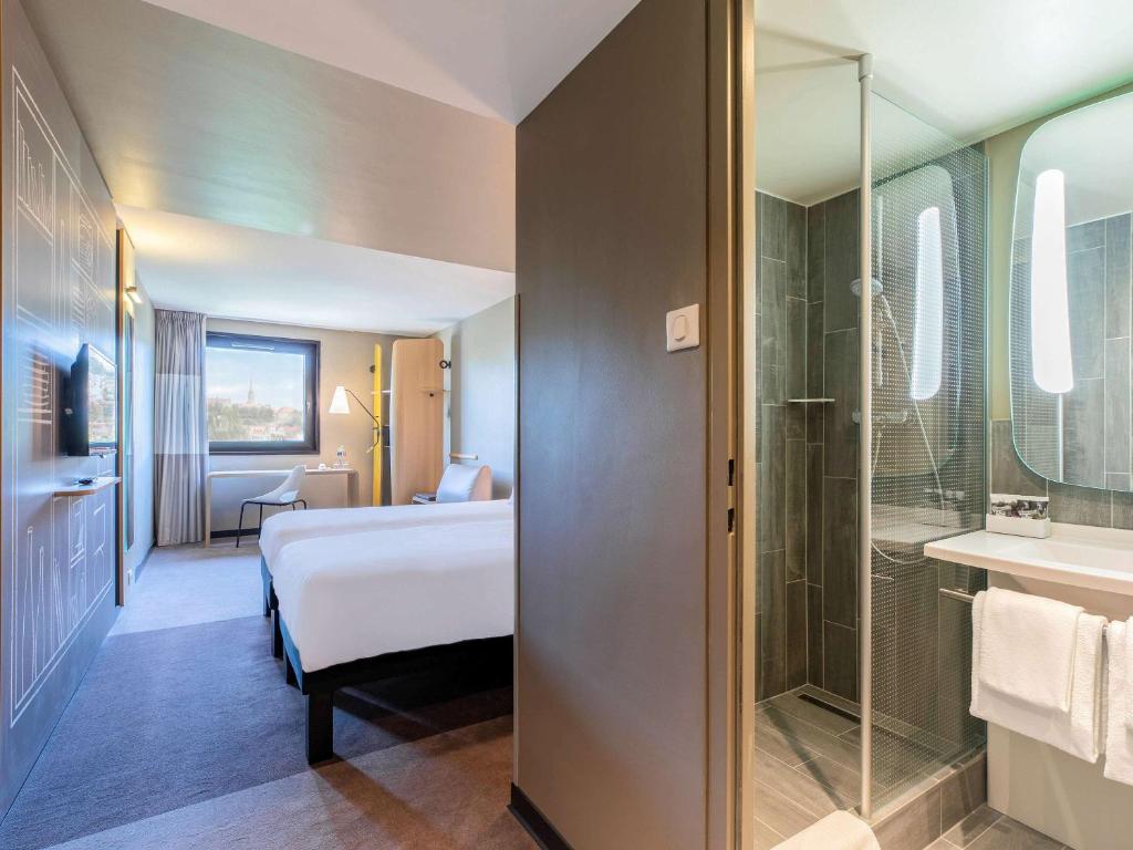 Posteľ alebo postele v izbe v ubytovaní ibis Budapest Castle Hill