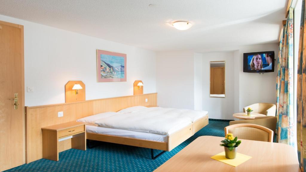 Postel nebo postele na pokoji v ubytování Hotel Portjengrat