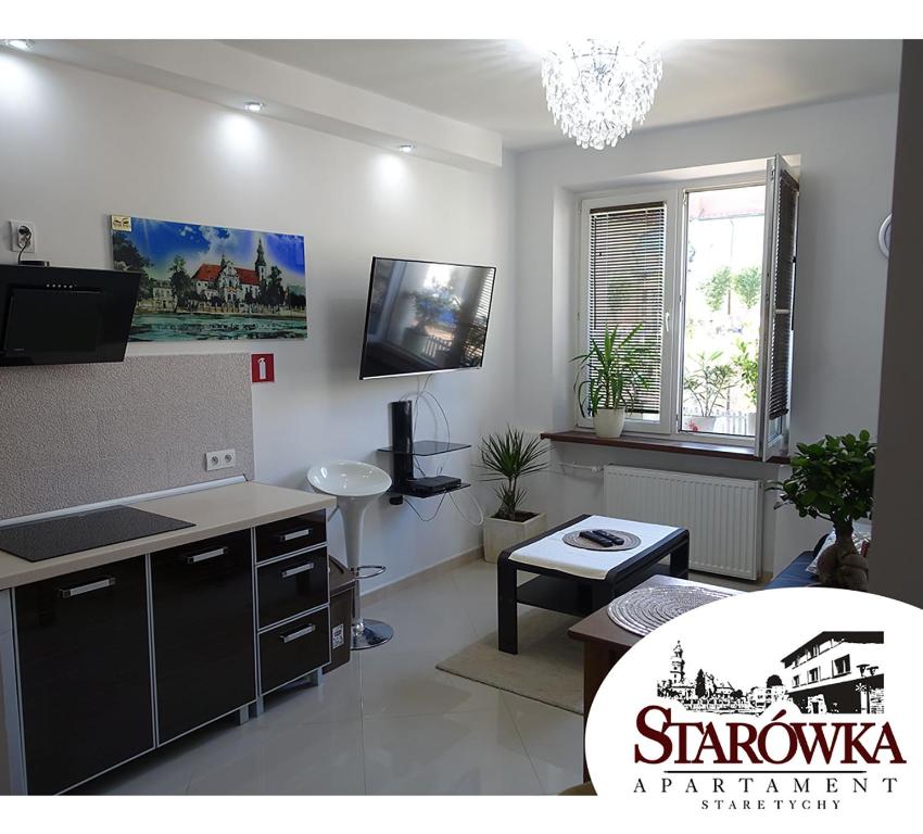 TV a/nebo společenská místnost v ubytování STARÓWKA Apartament Stare Tychy