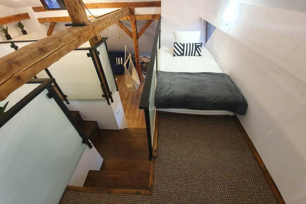 Posteľ alebo postele v izbe v ubytovaní Koci Dom Loft