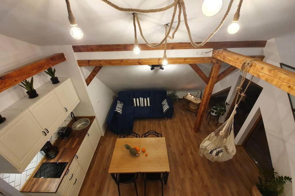 Kuchyňa alebo kuchynka v ubytovaní Koci Dom Loft