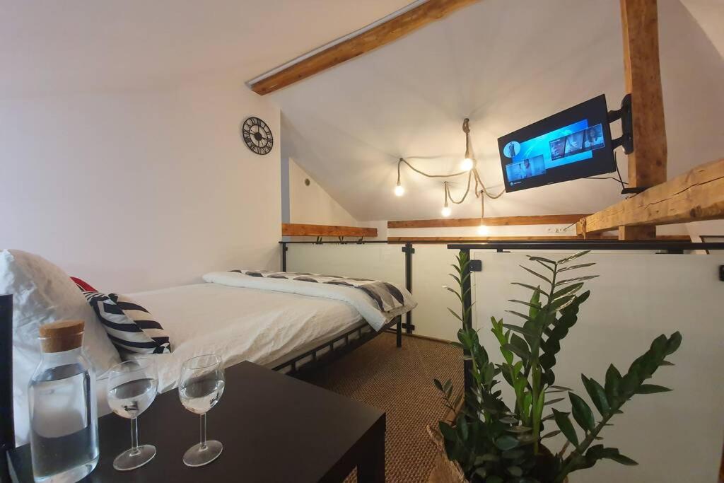 Televízia a/alebo spoločenská miestnosť v ubytovaní Koci Dom Loft