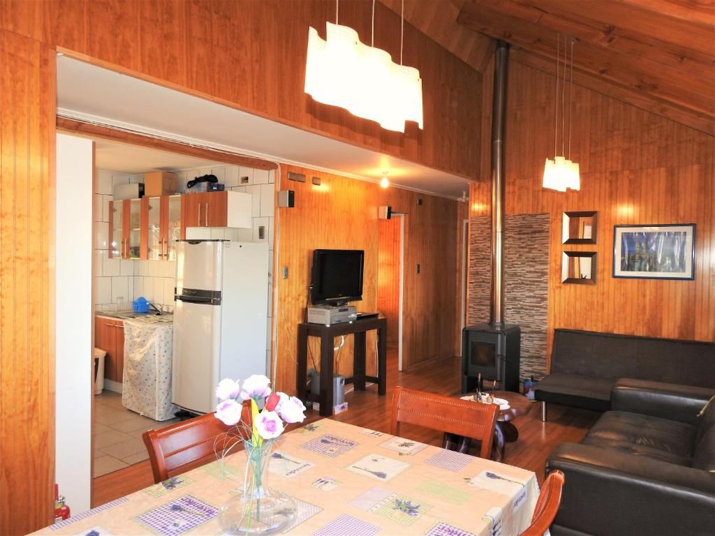 TV a/nebo společenská místnost v ubytování Casa Amoblada Frutillar