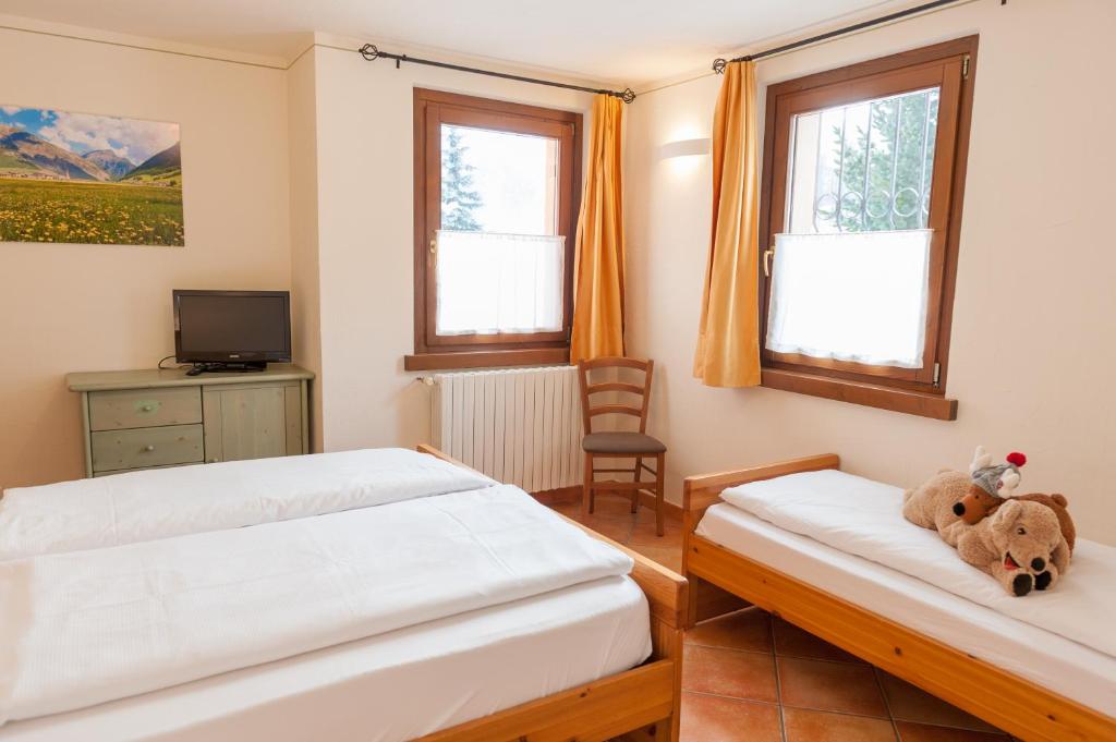 Letto o letti in una camera di Residence Bait da Mott