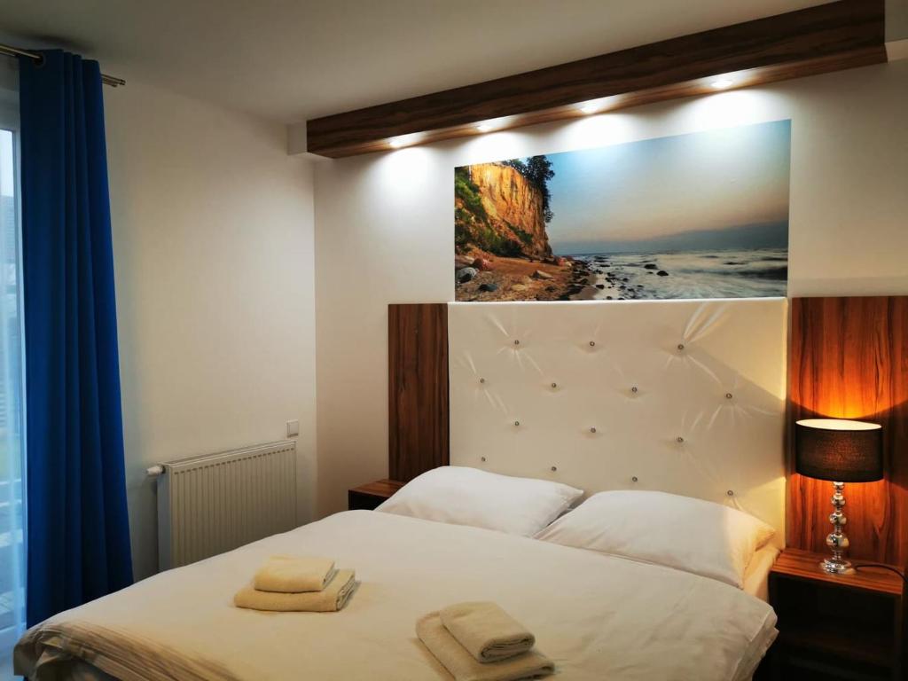 Postel nebo postele na pokoji v ubytování Holiday Amber -