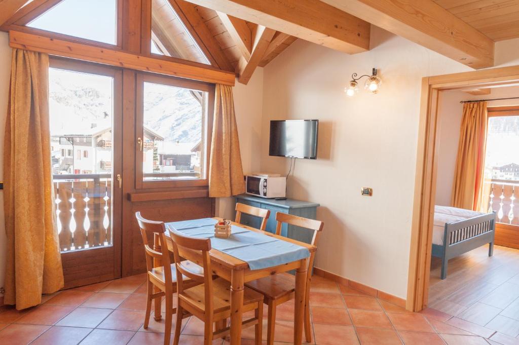 TV o dispositivi per l'intrattenimento presso Residence Bait da Mott