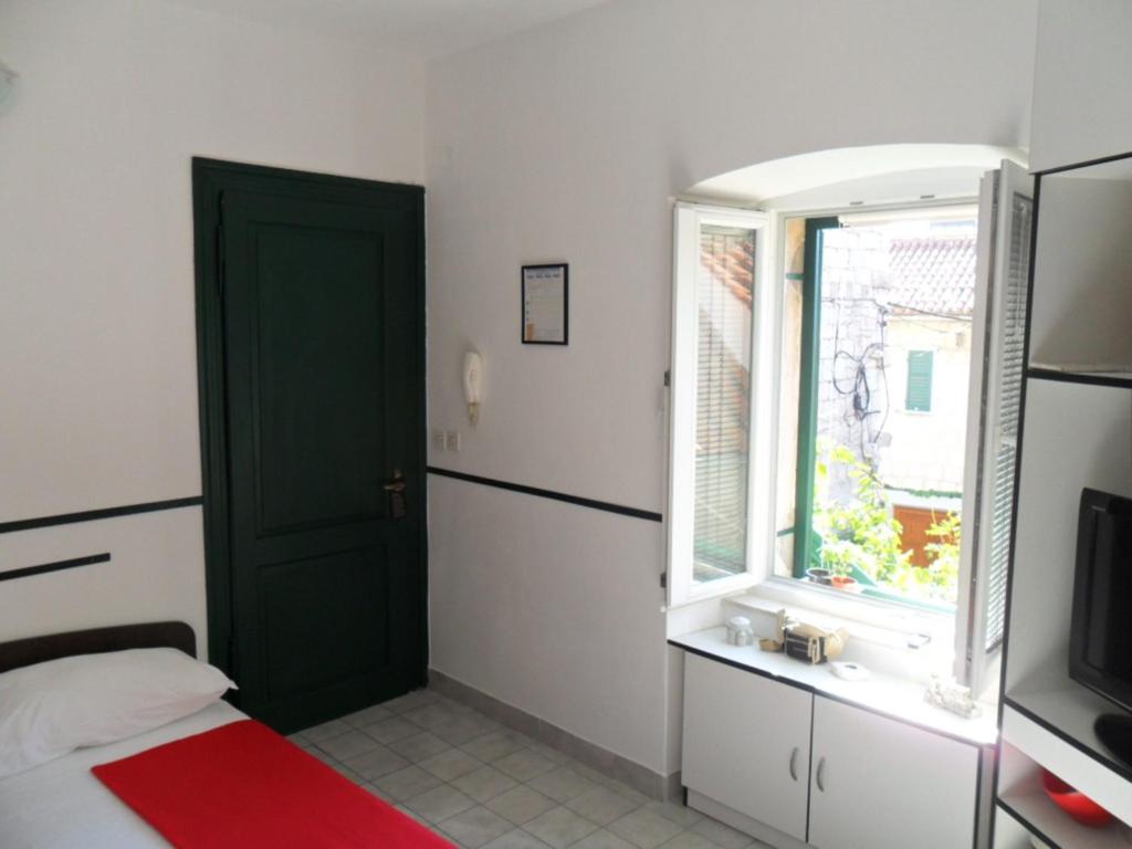 Kuchyň nebo kuchyňský kout v ubytování Apartments Villa Dube