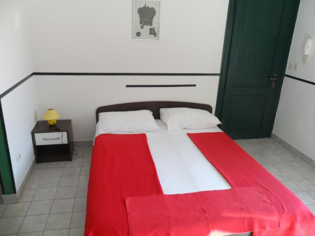Postel nebo postele na pokoji v ubytování Apartments Villa Dube